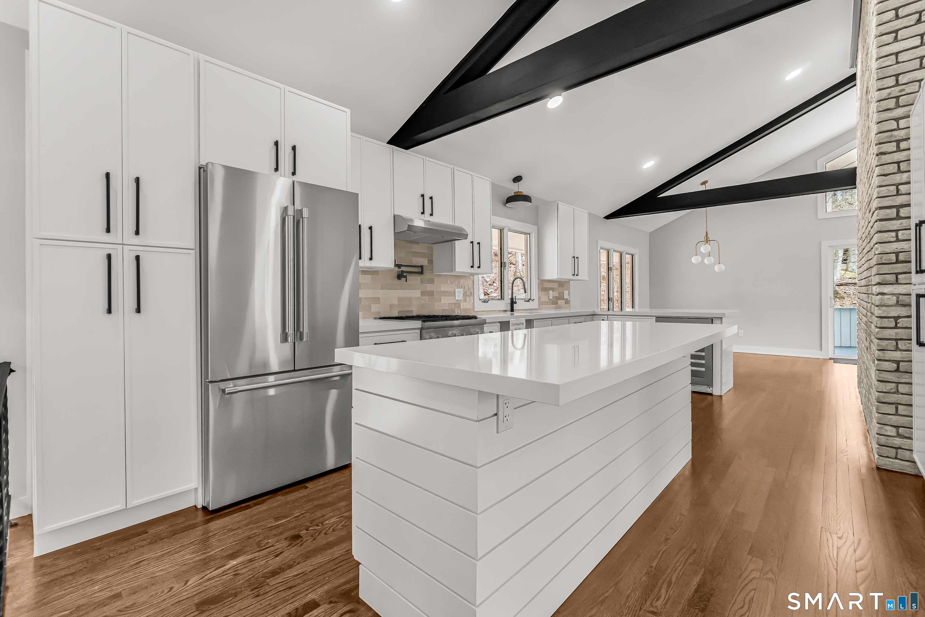 73 Buck Hill Road Easton, CT 06612 - Photo 15 of 44 a kitchen with stainless steel appliances granite countertop a refrigerator a sink and a stove