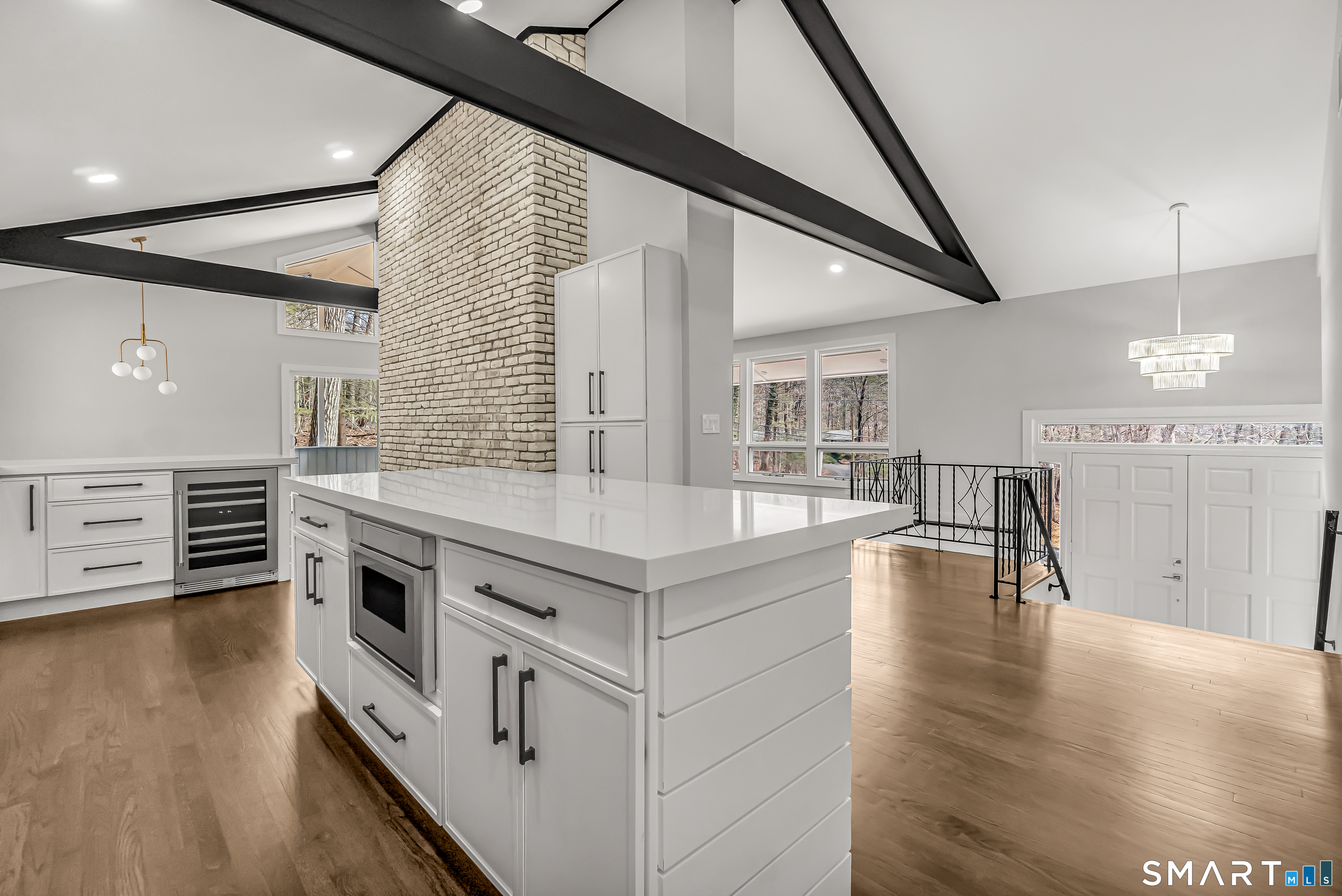 73 Buck Hill Road Easton, CT 06612 - Photo 16 of 44 a kitchen with stainless steel appliances granite countertop a stove and a wooden floors