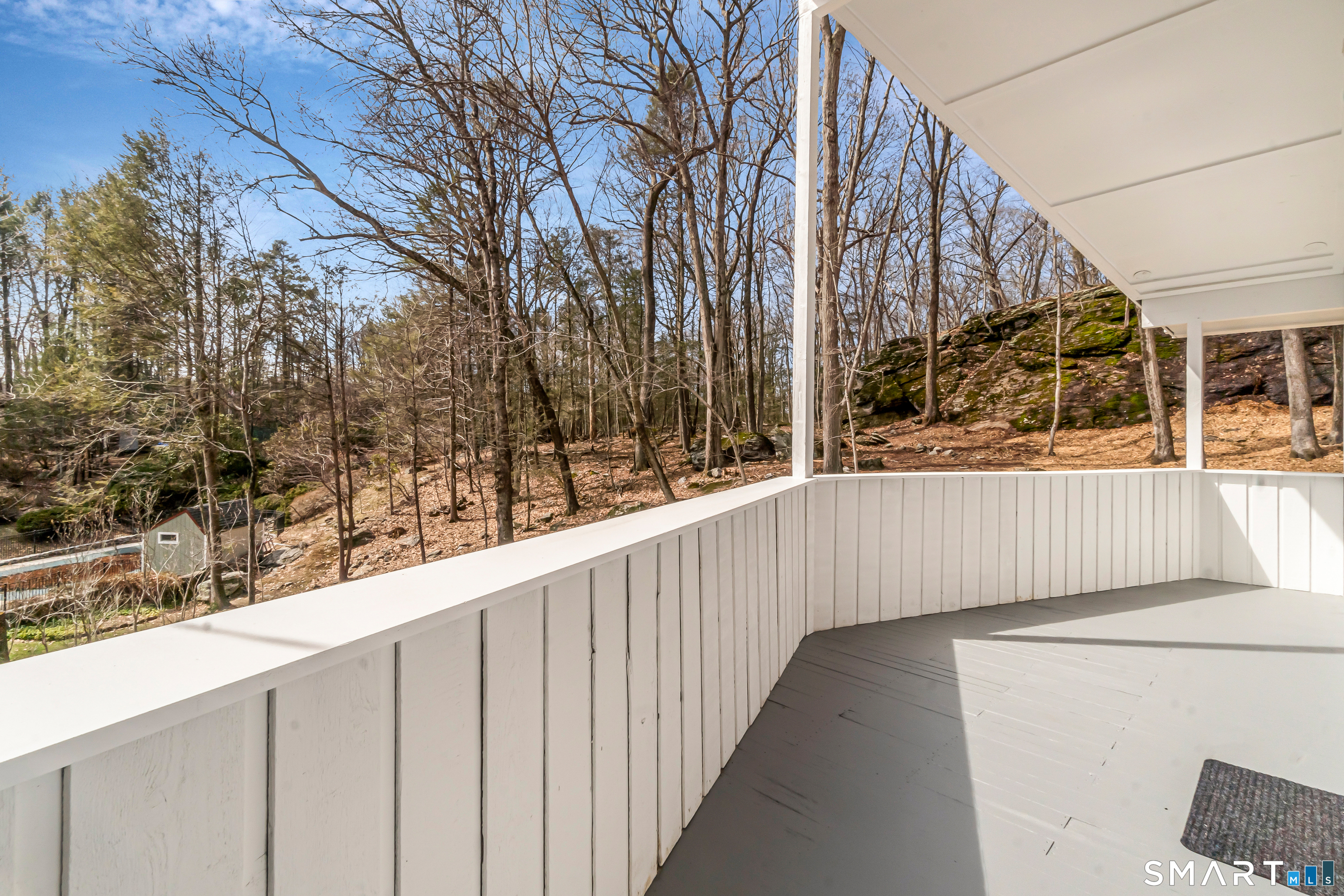 73 Buck Hill Road Easton, CT 06612 - Photo 21 of 44 a view of a wooden fence and trees