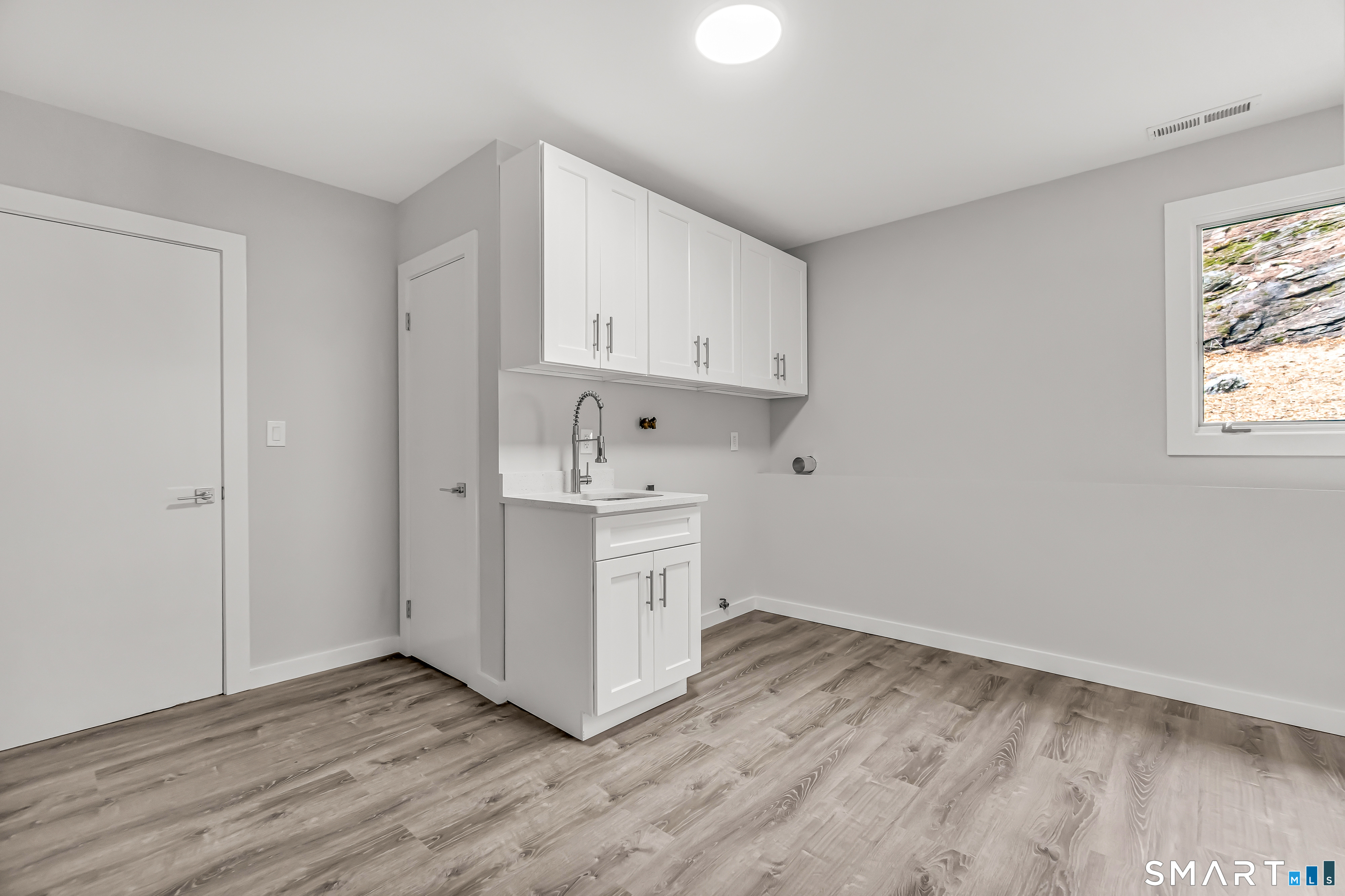 73 Buck Hill Road Easton, CT 06612 - Photo 32 of 44 a view of kitchen with wooden floor