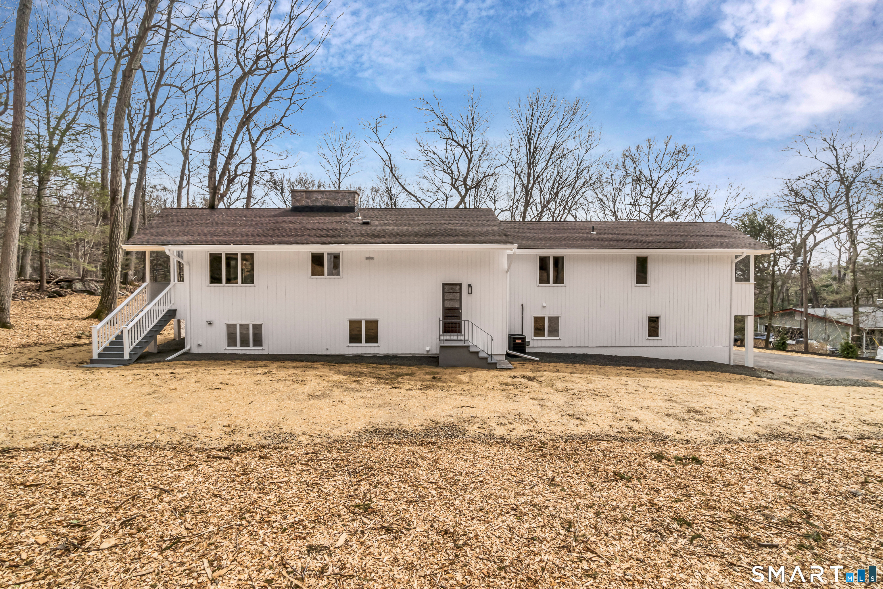 73 Buck Hill Road Easton, CT 06612 - Photo 42 of 44 a view of a house with snow on the background