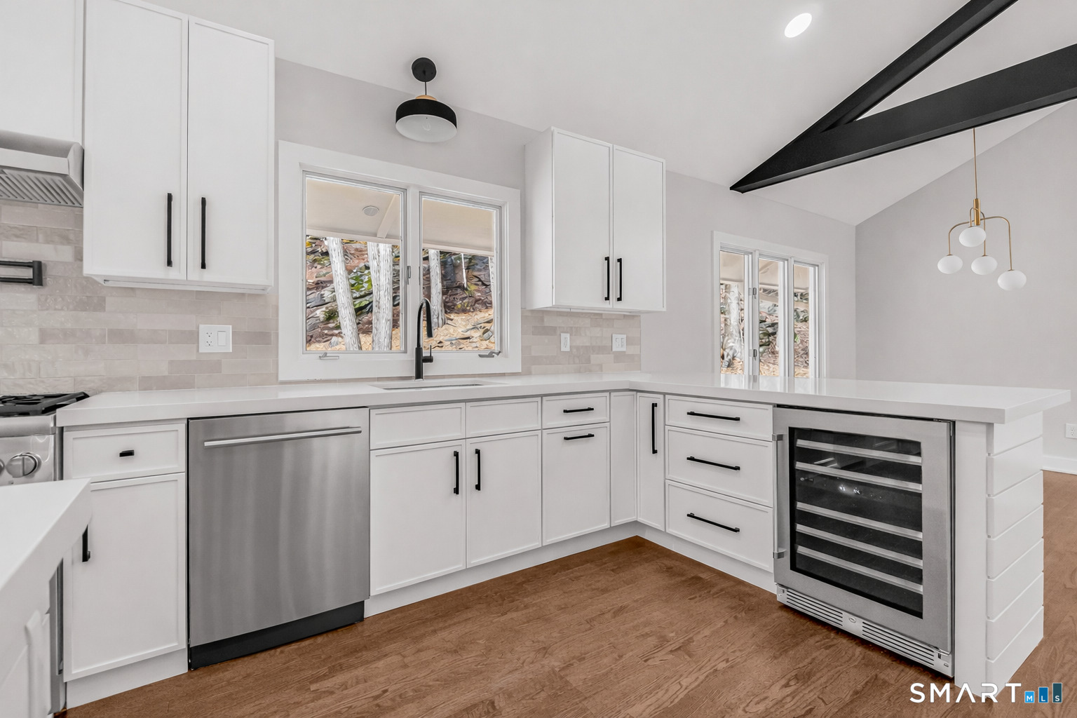 73 Buck Hill Road Easton, CT 06612 - Photo 10 of 44 a kitchen with cabinets appliances and a window