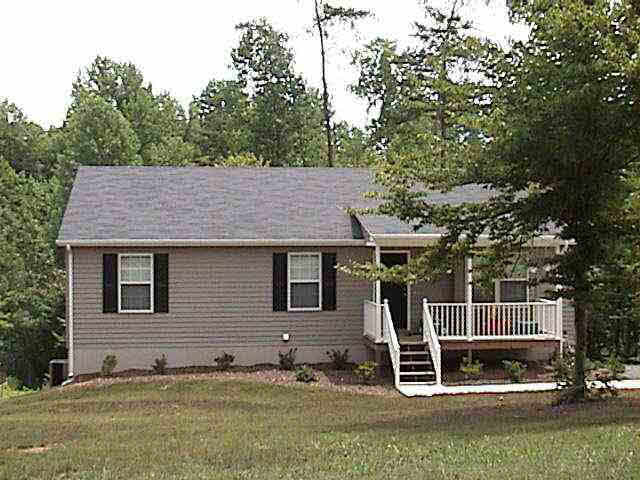 8 Haversack Road Lake Monticello, VA 22963 - Photo 1 of 1 a view of a house with backyard and a tree