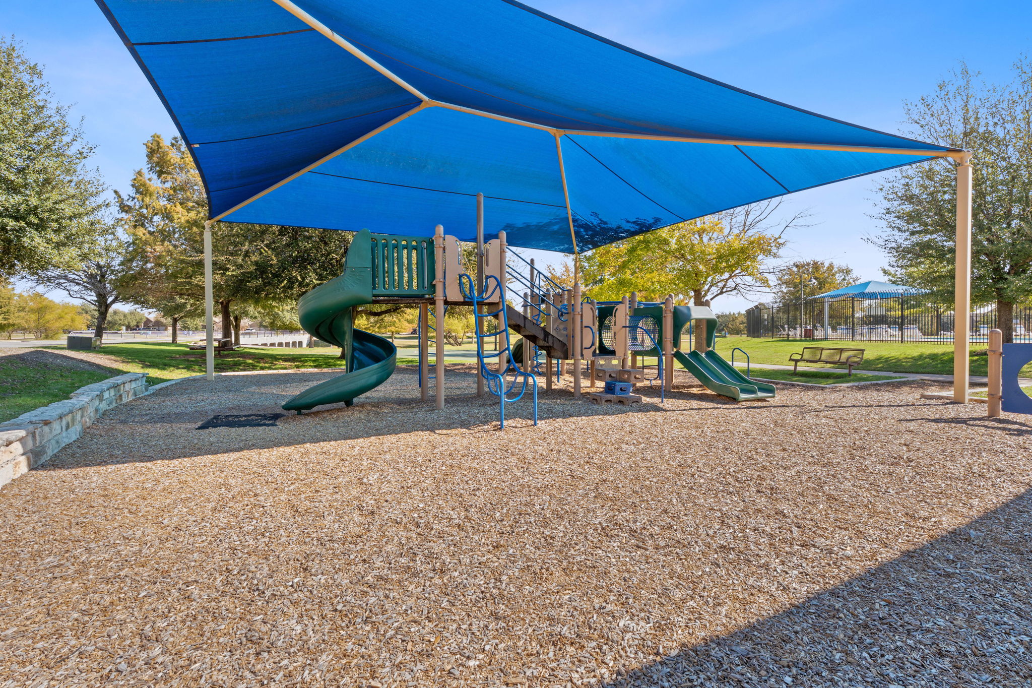 21100 Windmill Ranch Avenue Pflugerville, TX 78660 - Photo 26 of 29 Community jungle gym with a lawn
