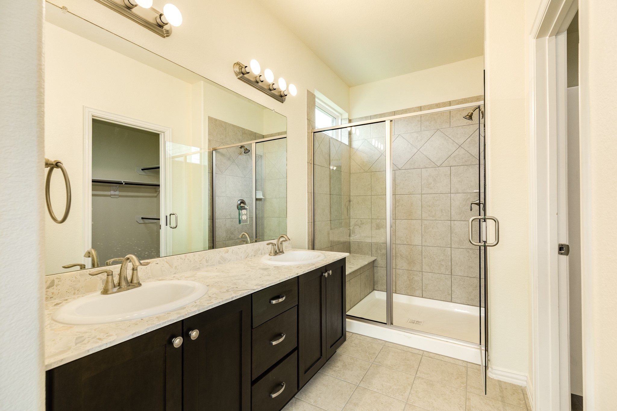 1301 Scarlet Mountain Drive Rosharon, TX 77583 - Photo 14 of 43 a bathroom with a double vanity sink mirror double and shower
