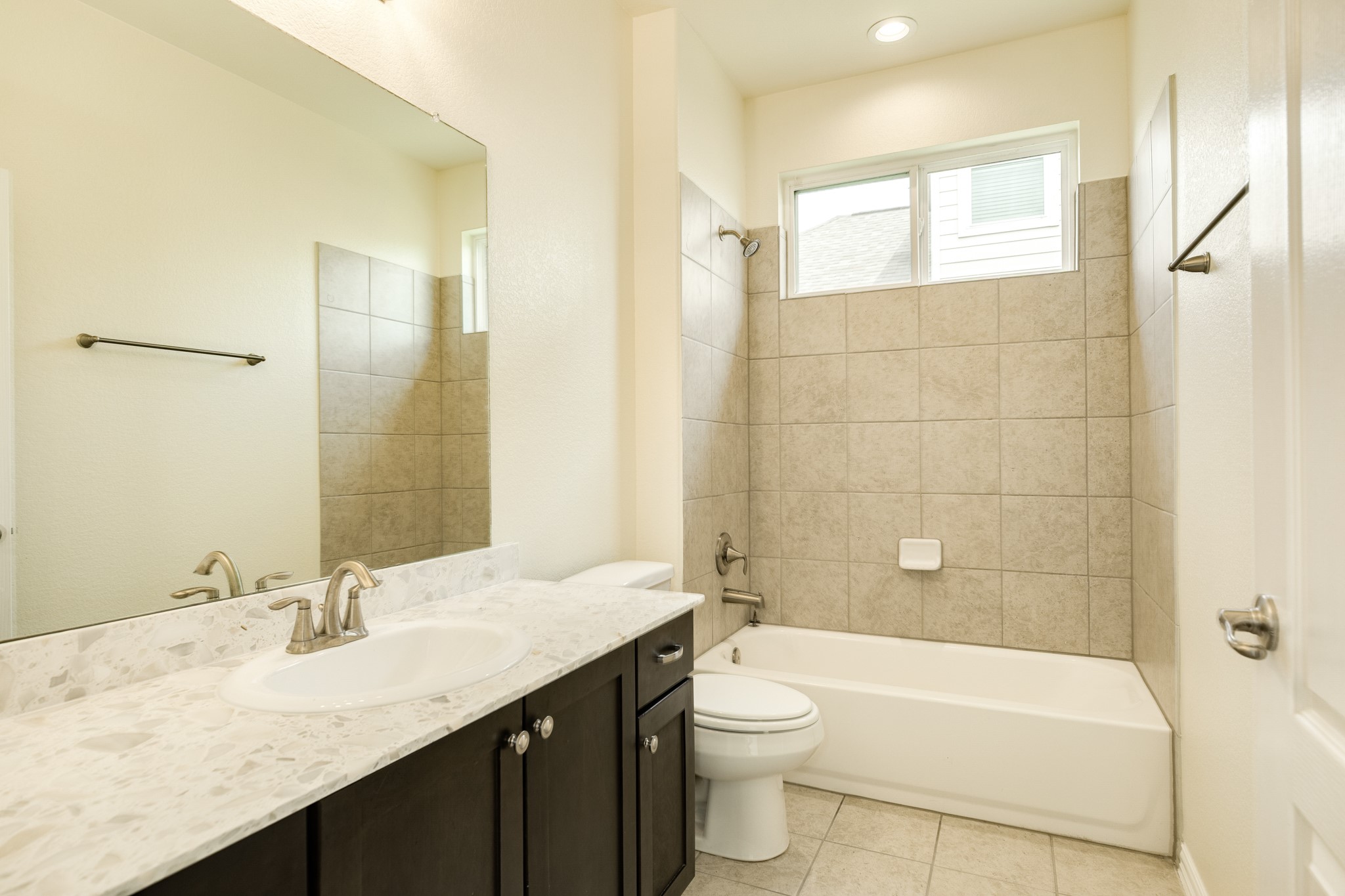 1301 Scarlet Mountain Drive Rosharon, TX 77583 - Photo 20 of 43 a bathroom with a granite countertop sink toilet and shower