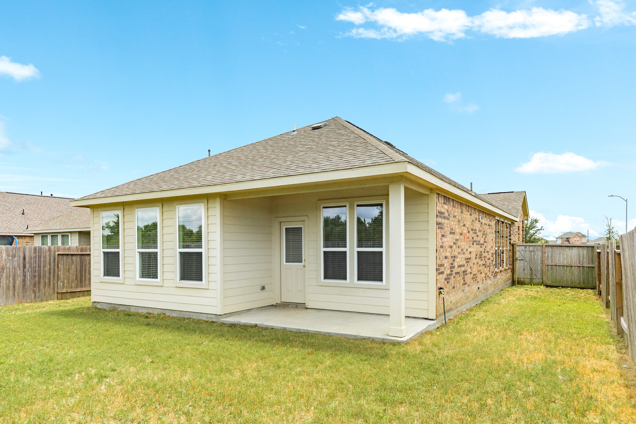 1301 Scarlet Mountain Drive Rosharon, TX 77583 - Photo 22 of 43 a view of a house with a backyard