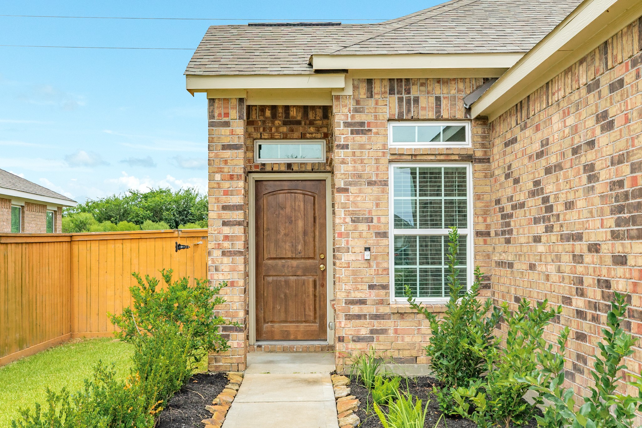 1301 Scarlet Mountain Drive Rosharon, TX 77583 - Photo 3 of 43 a front view of a house with a yard