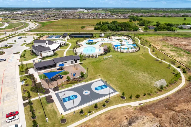 a view of a swimming pool and outdoor space