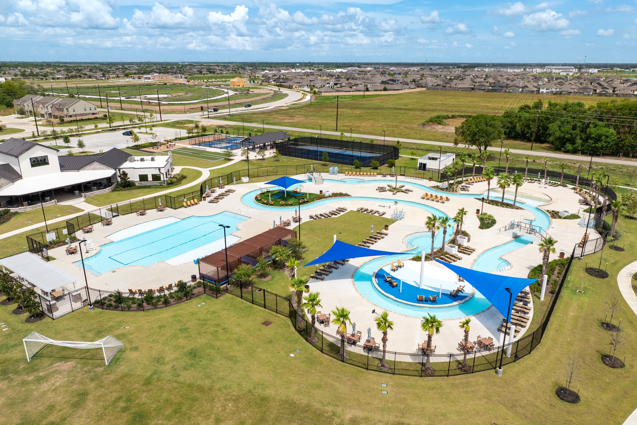 1301 Scarlet Mountain Drive Rosharon, TX 77583 - Photo 37 of 43 a view of a swimming pool with an ocean view