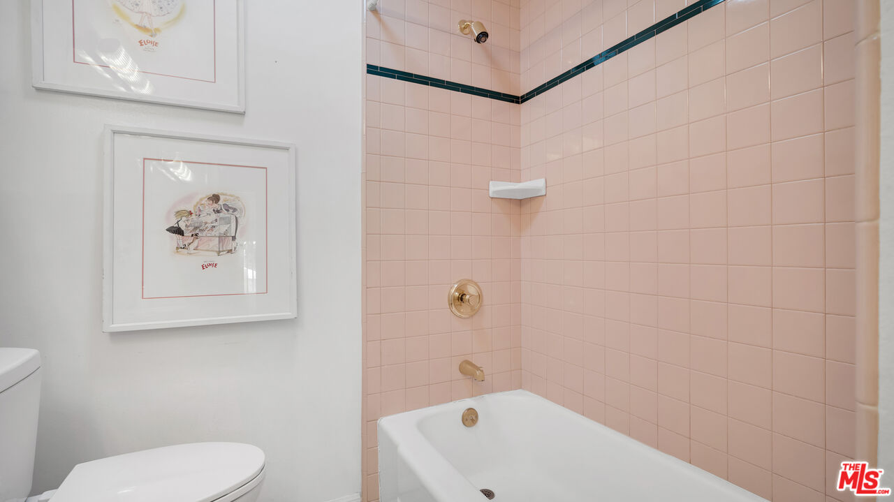 18501 Germain Street Porter Ranch, CA 91326 - Photo 25 of 55 a bathroom with a toilet and a shower