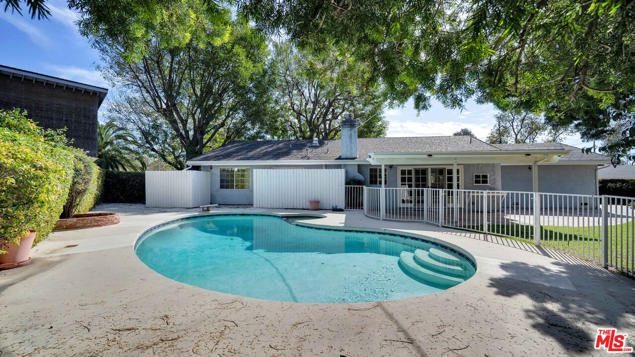 18501 Germain Street Porter Ranch, CA 91326 - Photo 42 of 55 a view of a house with a backyard
