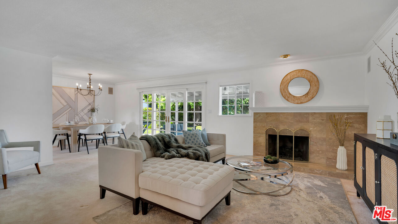 18501 Germain Street Porter Ranch, CA 91326 - Photo 5 of 55 a living room with furniture and a fireplace