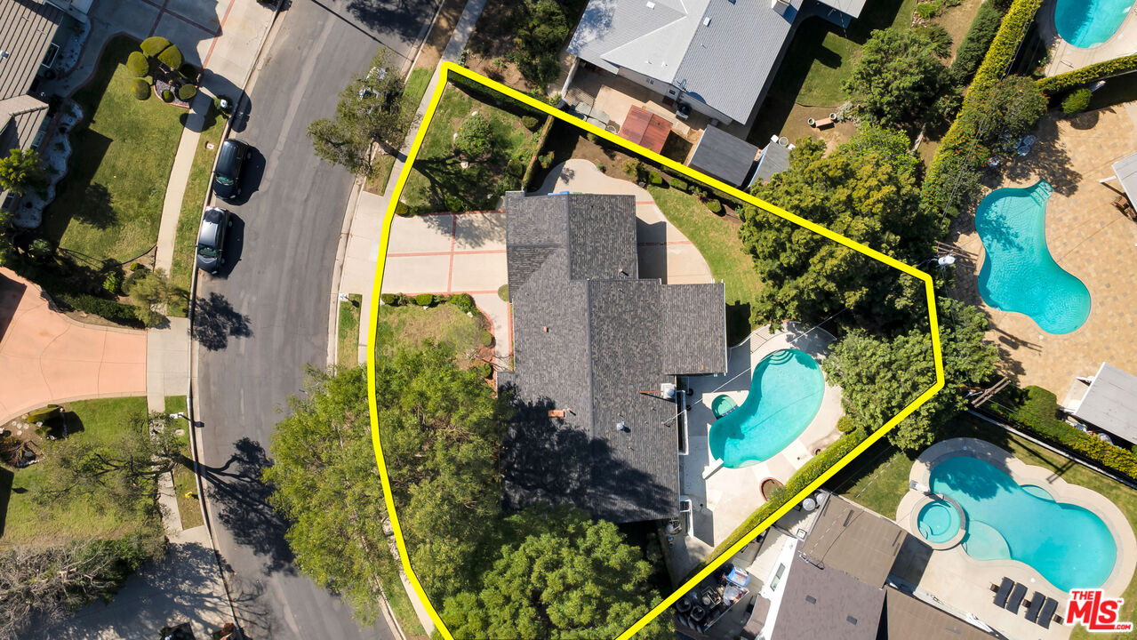 18501 Germain Street Porter Ranch, CA 91326 - Photo 53 of 55 an aerial view of a house with a garden