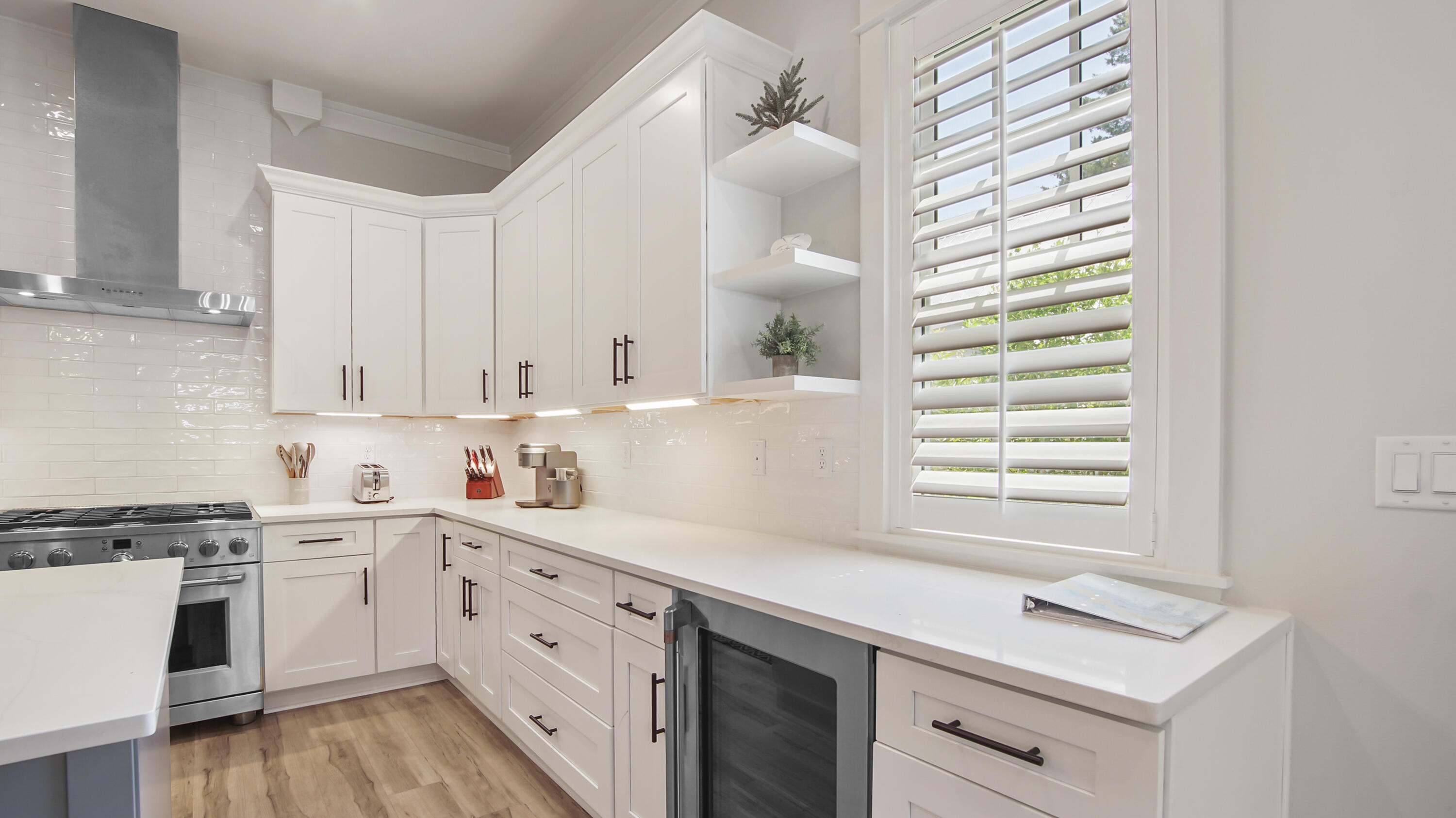 51 Okeechobee West Santa Rosa Beach, FL 32459 - Photo 12 of 78 a kitchen with granite countertop white cabinets and white appliances