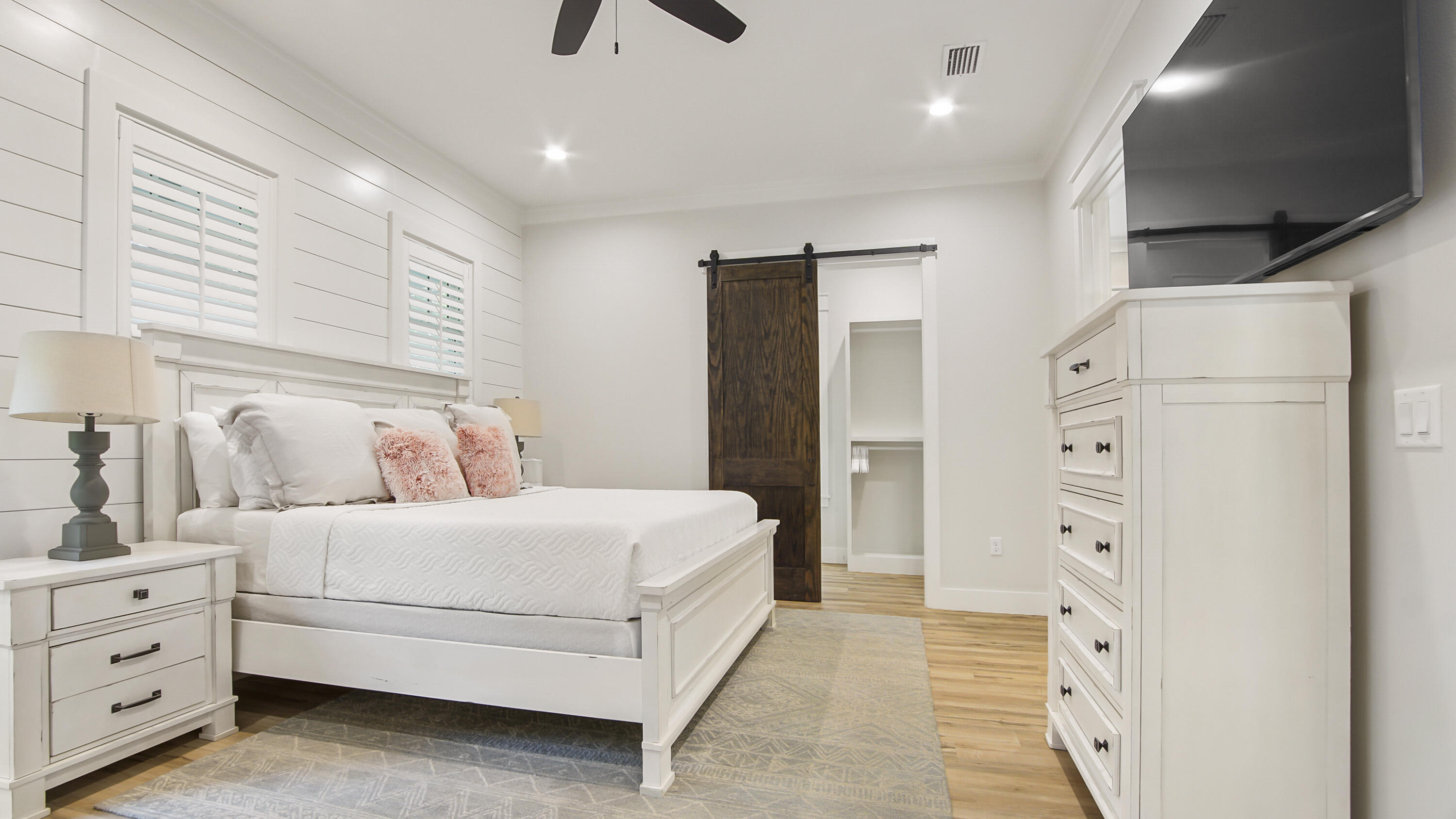 51 Okeechobee West Santa Rosa Beach, FL 32459 - Photo 25 of 78 a bedroom with a bed and a flat screen tv