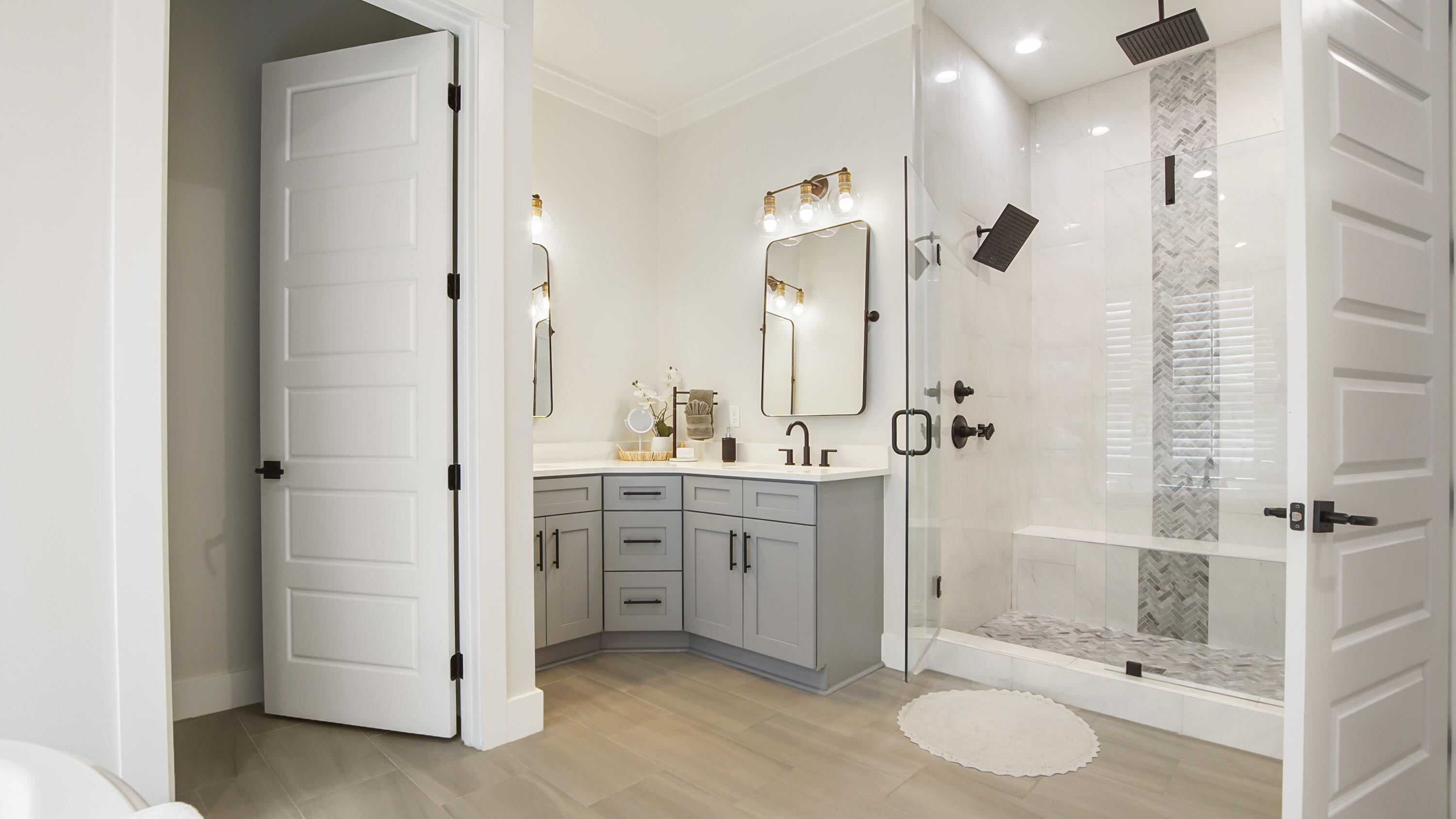 51 Okeechobee West Santa Rosa Beach, FL 32459 - Photo 30 of 78 a bathroom with a double vanity sink toilet mirror and shower