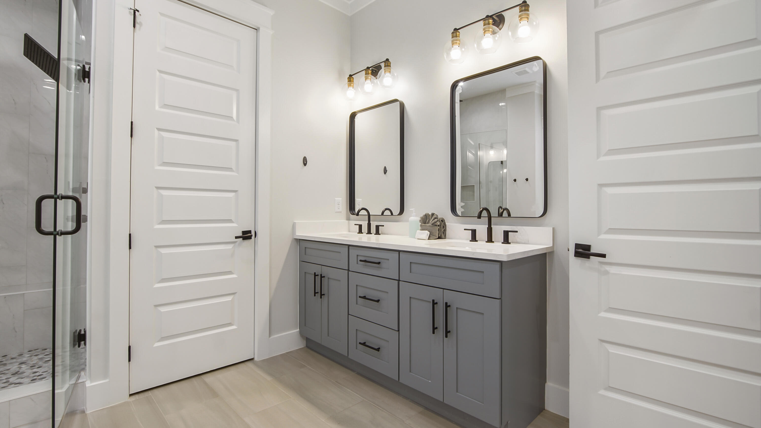 51 Okeechobee West Santa Rosa Beach, FL 32459 - Photo 43 of 78 a bathroom with a double vanity sink and a mirror