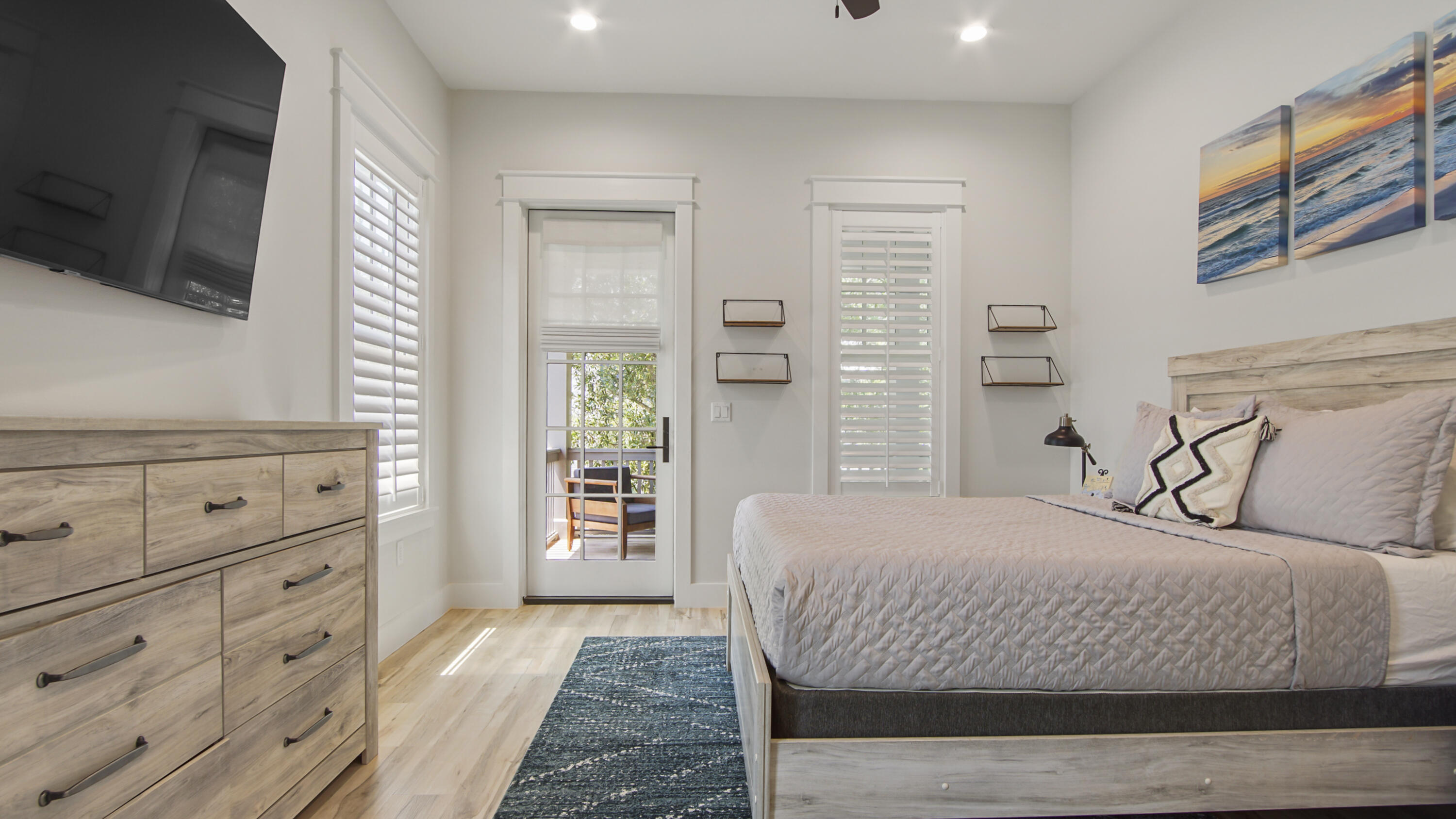 51 Okeechobee West Santa Rosa Beach, FL 32459 - Photo 56 of 78 a bedroom with a bed and flat screen tv