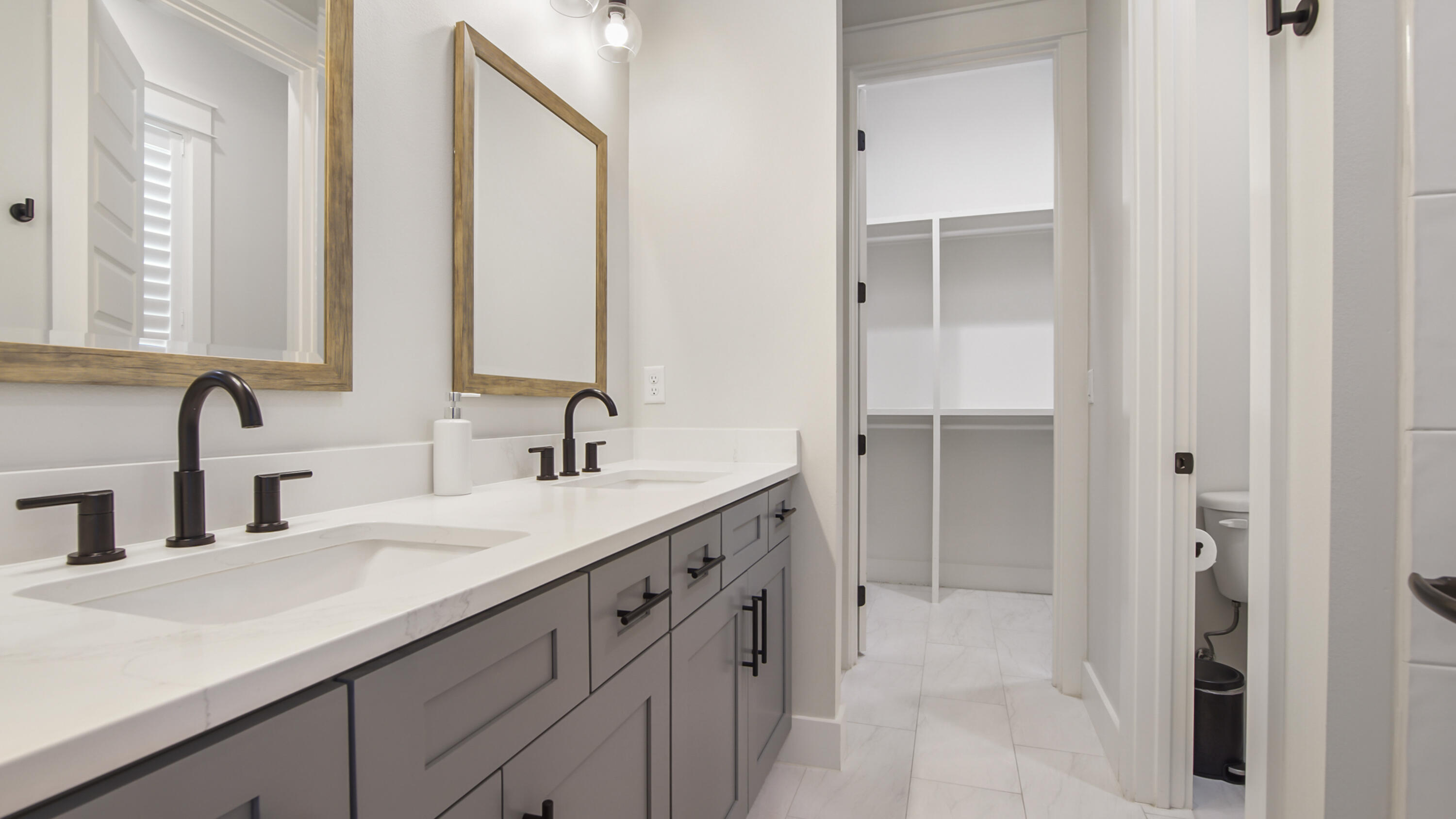 51 Okeechobee West Santa Rosa Beach, FL 32459 - Photo 58 of 78 a bathroom with a double vanity sink and a mirror