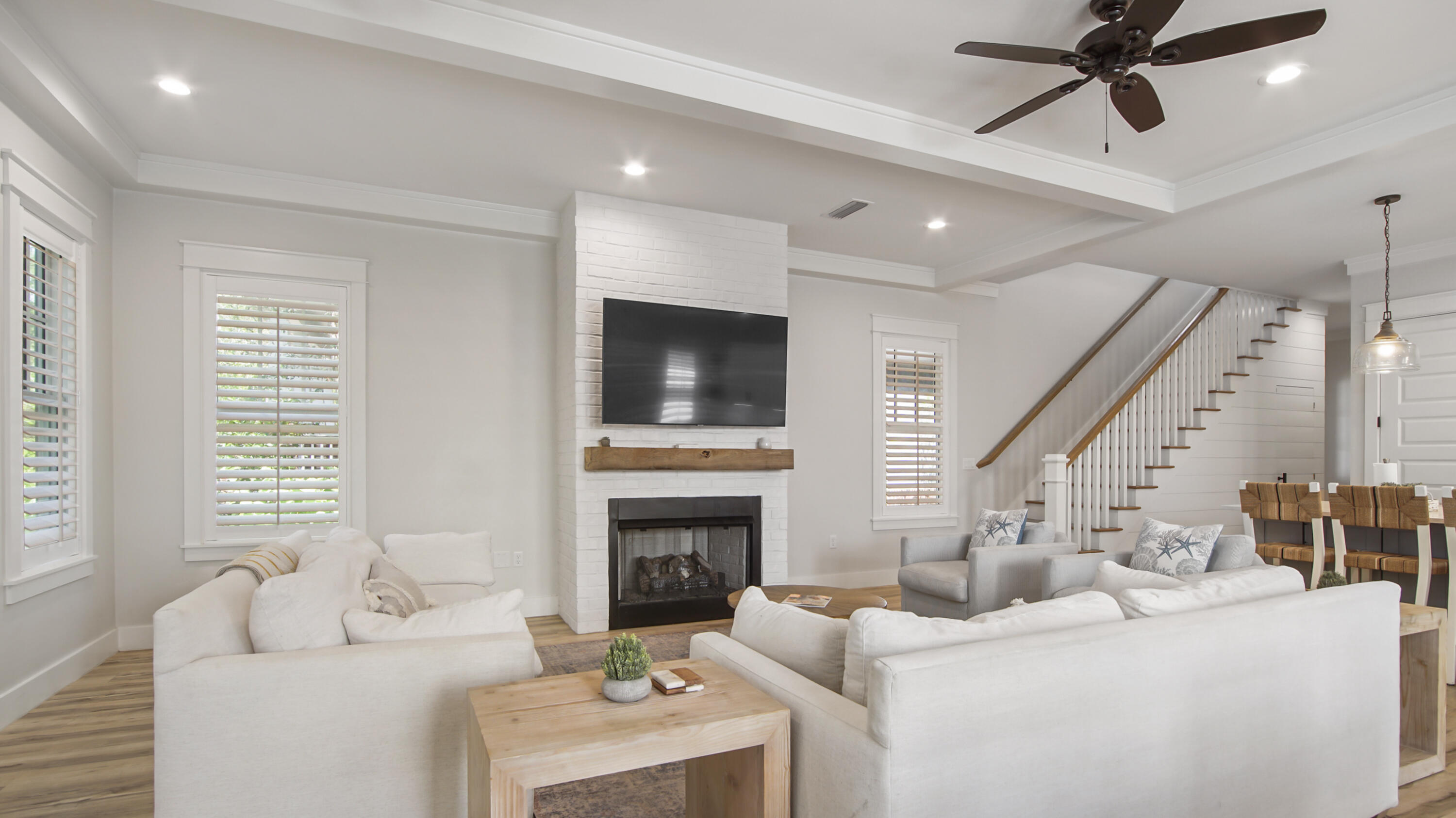 51 Okeechobee West Santa Rosa Beach, FL 32459 - Photo 7 of 78 a living room with furniture a fireplace and a flat screen tv