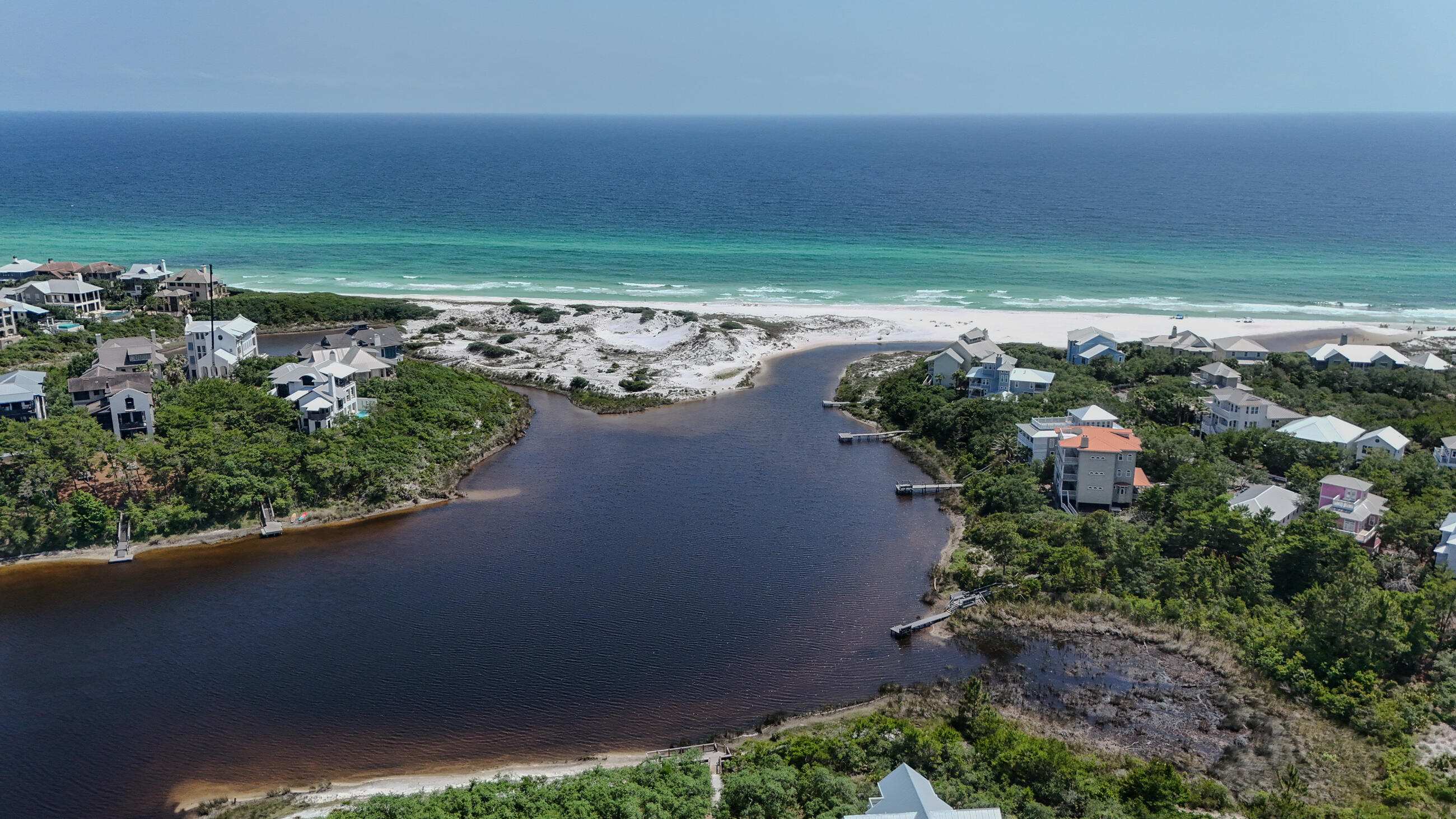 51 Okeechobee West Santa Rosa Beach, FL 32459 - Photo 73 of 78 an aerial view of a house with a yard and lake view