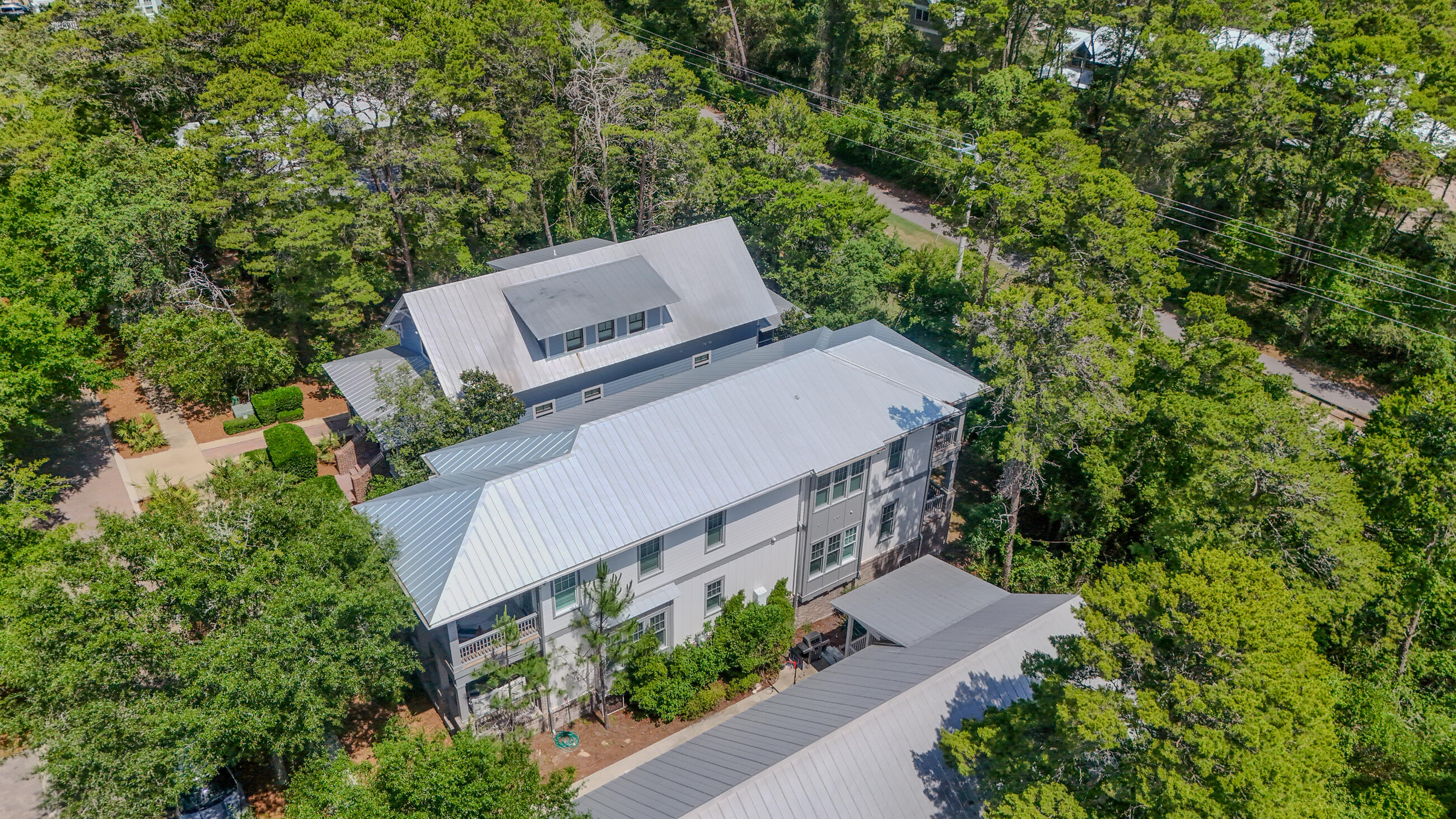 51 Okeechobee West Santa Rosa Beach, FL 32459 - Photo 77 of 78 an aerial view of a house with a yard and large trees