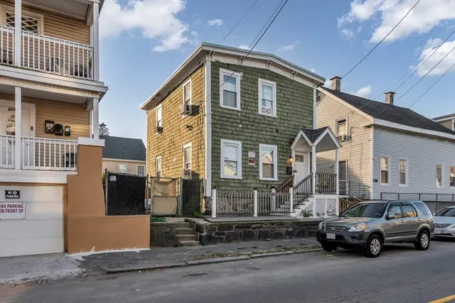 a view of a car park in front of a building