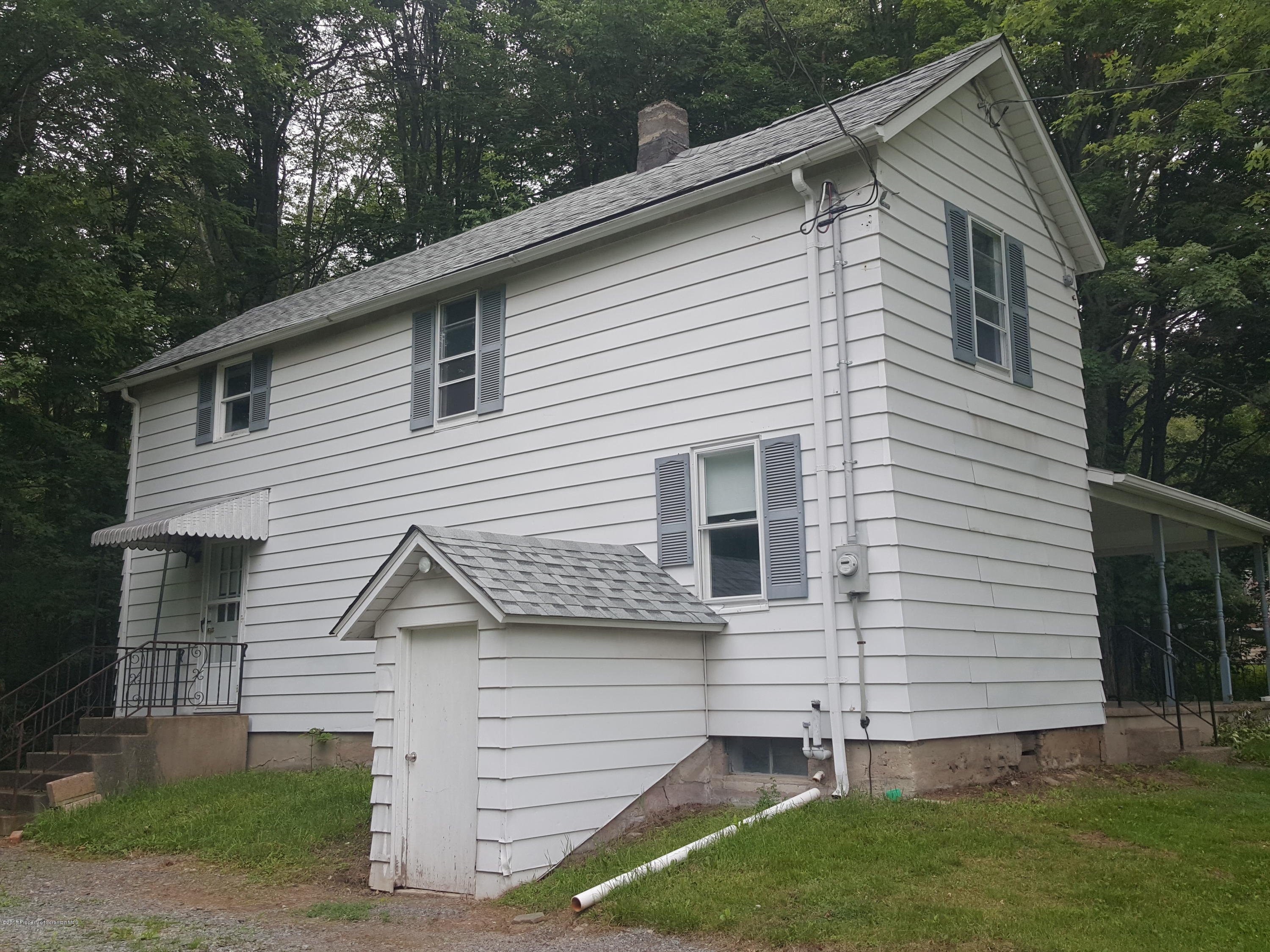 2471 Motichka Road Moscow, PA 18444 - Photo 3 of 20 a view of a house with a yard