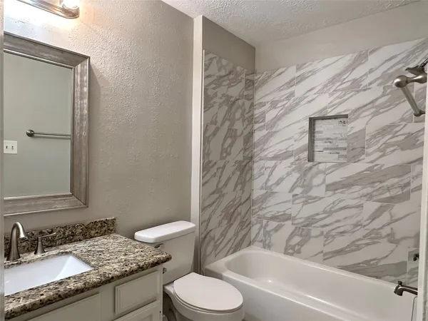 a bathroom with a bathtub