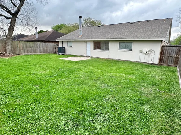 a view of a backyard with a garden