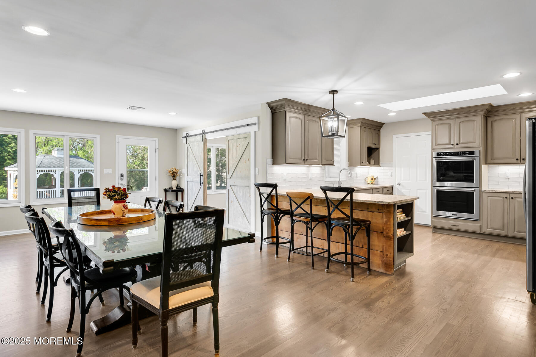 28 Colonial Terrace Colts Neck, NJ 07722 - Photo 16 of 57 a dining room with furniture and wooden floor