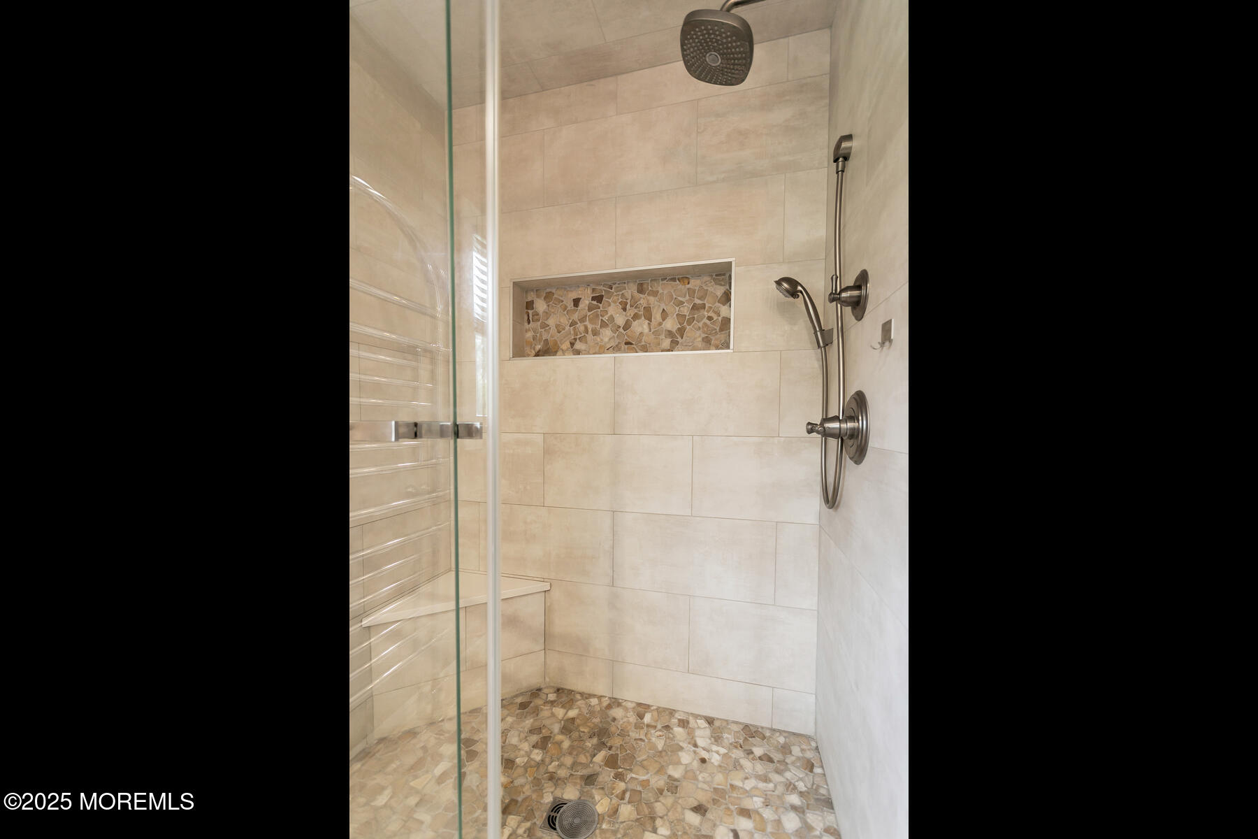 28 Colonial Terrace Colts Neck, NJ 07722 - Photo 25 of 57 a bathroom with a shower