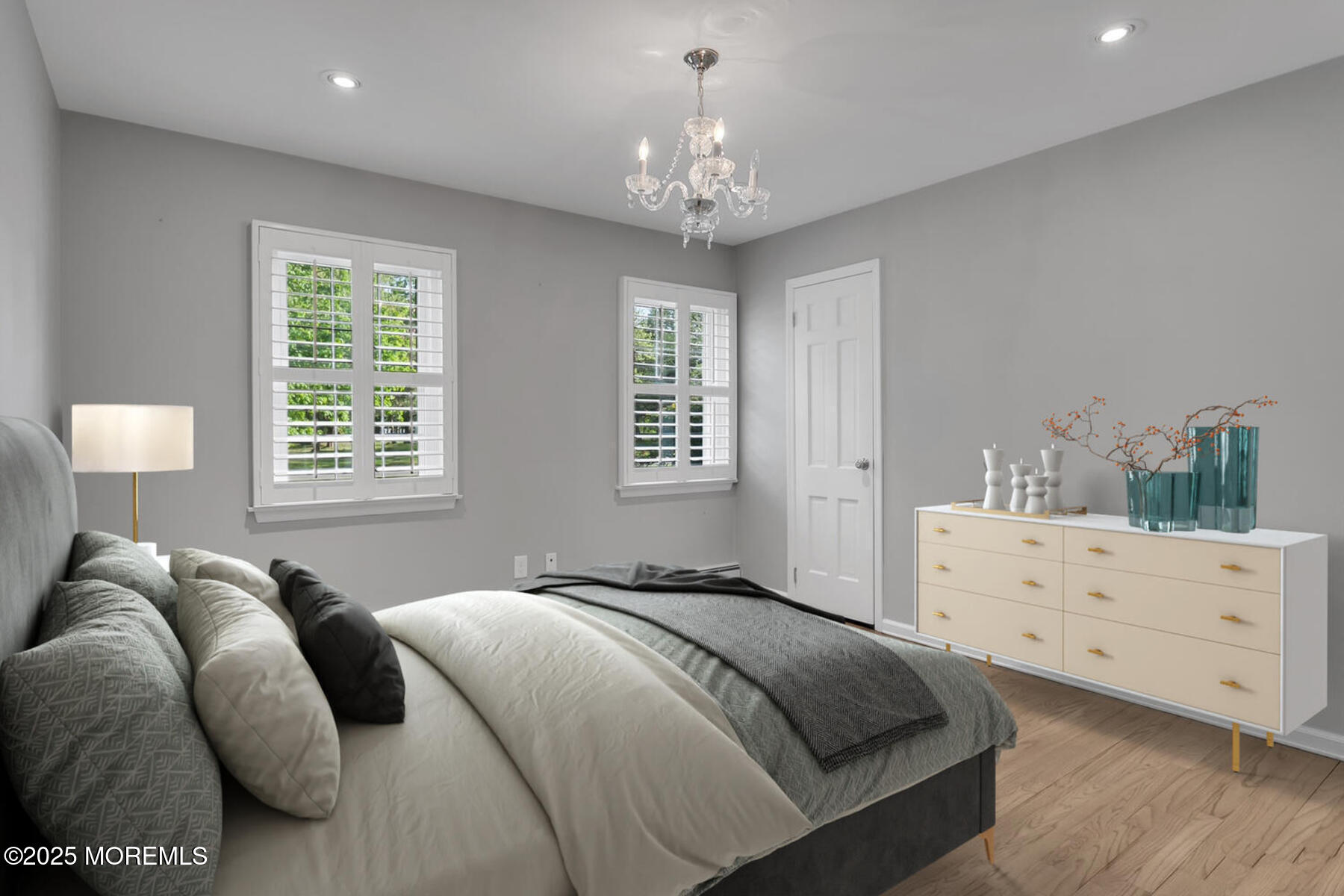 28 Colonial Terrace Colts Neck, NJ 07722 - Photo 26 of 57 a bedroom with a bed and a dresser