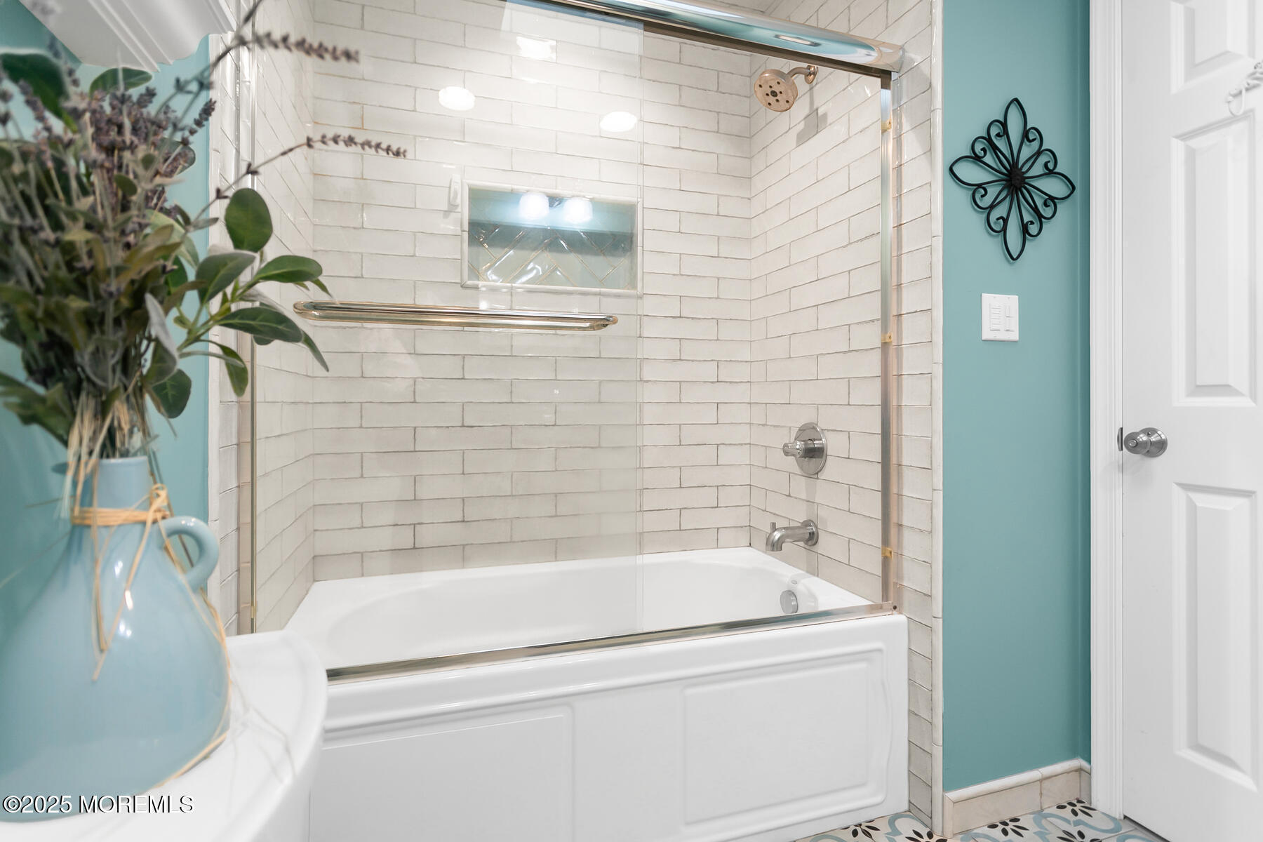 28 Colonial Terrace Colts Neck, NJ 07722 - Photo 29 of 57 a bathroom with a bathtub and shower