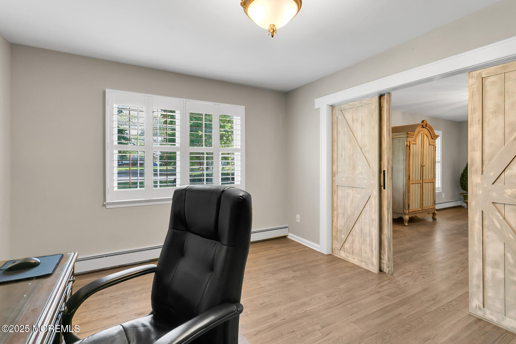 28 Colonial Terrace Colts Neck, NJ 07722 - Photo 31 of 57 a view of a livingroom with furniture and a window