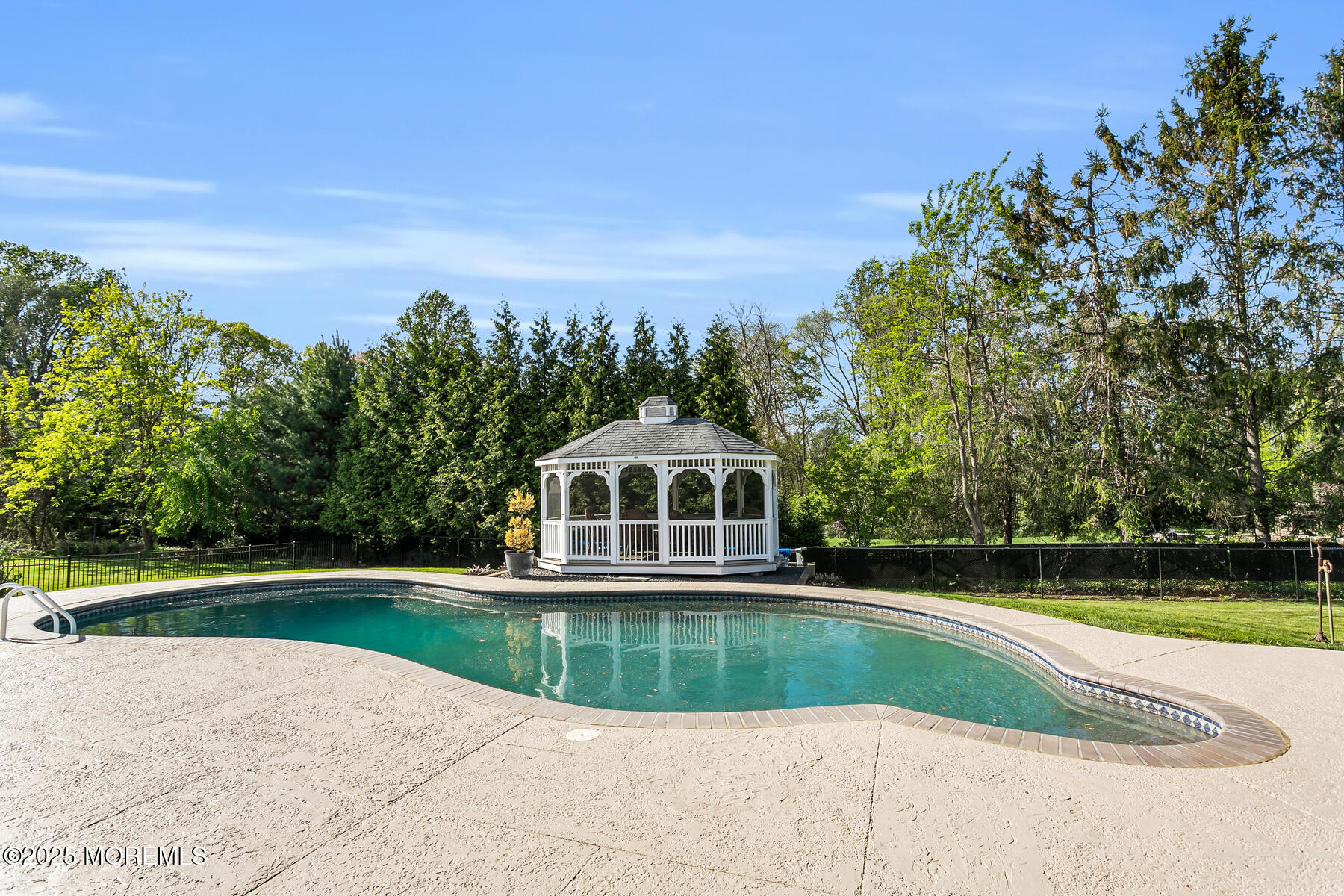 28 Colonial Terrace Colts Neck, NJ 07722 - Photo 46 of 57 a view of outdoor space yard and swimming pool