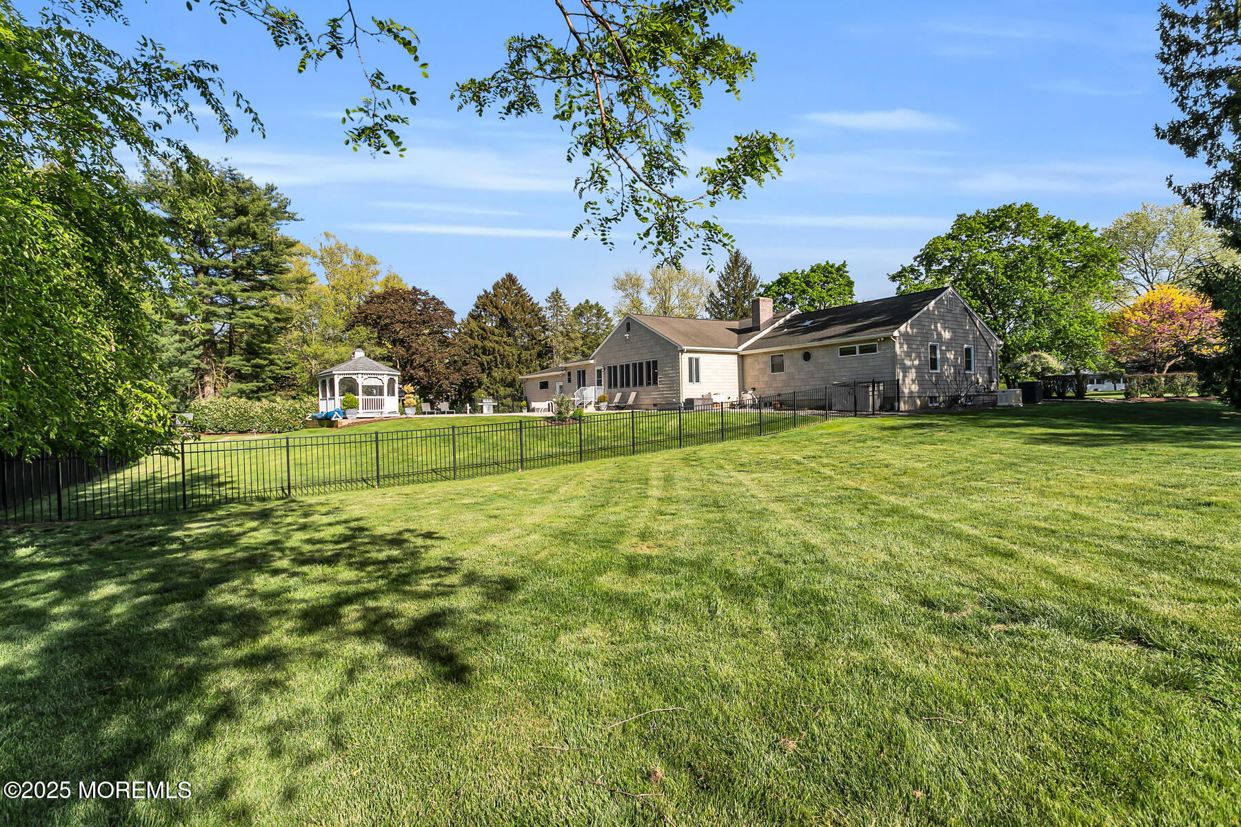 28 Colonial Terrace Colts Neck, NJ 07722 - Photo 51 of 57 a view of a house with a big yard