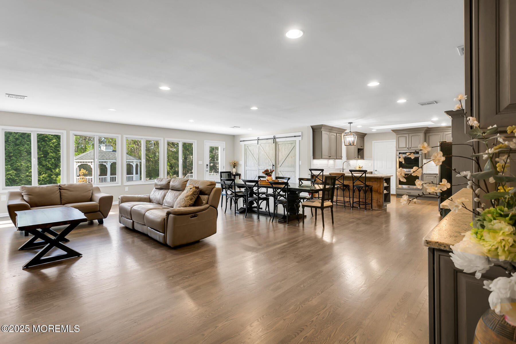 28 Colonial Terrace Colts Neck, NJ 07722 - Photo 7 of 57 a living room with furniture and a large window