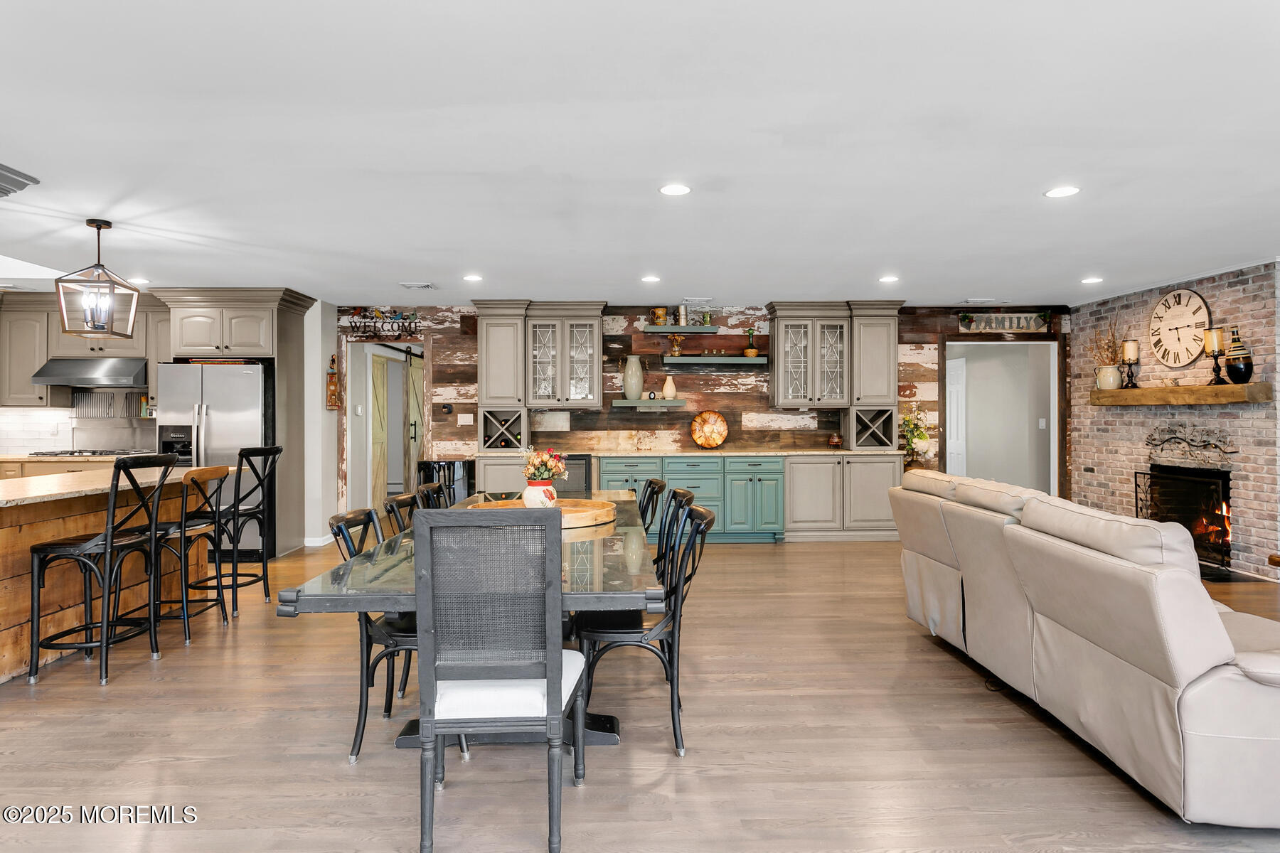 28 Colonial Terrace Colts Neck, NJ 07722 - Photo 56 of 57 a living room with furniture and a fireplace