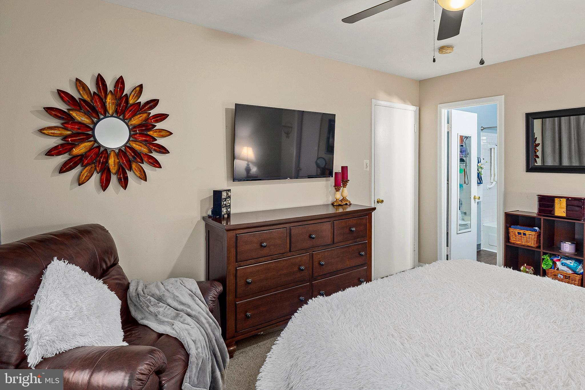 9550 Transfer Row Columbia, MD 21045 - Photo 14 of 27 a bedroom with a bed and a flat screen tv