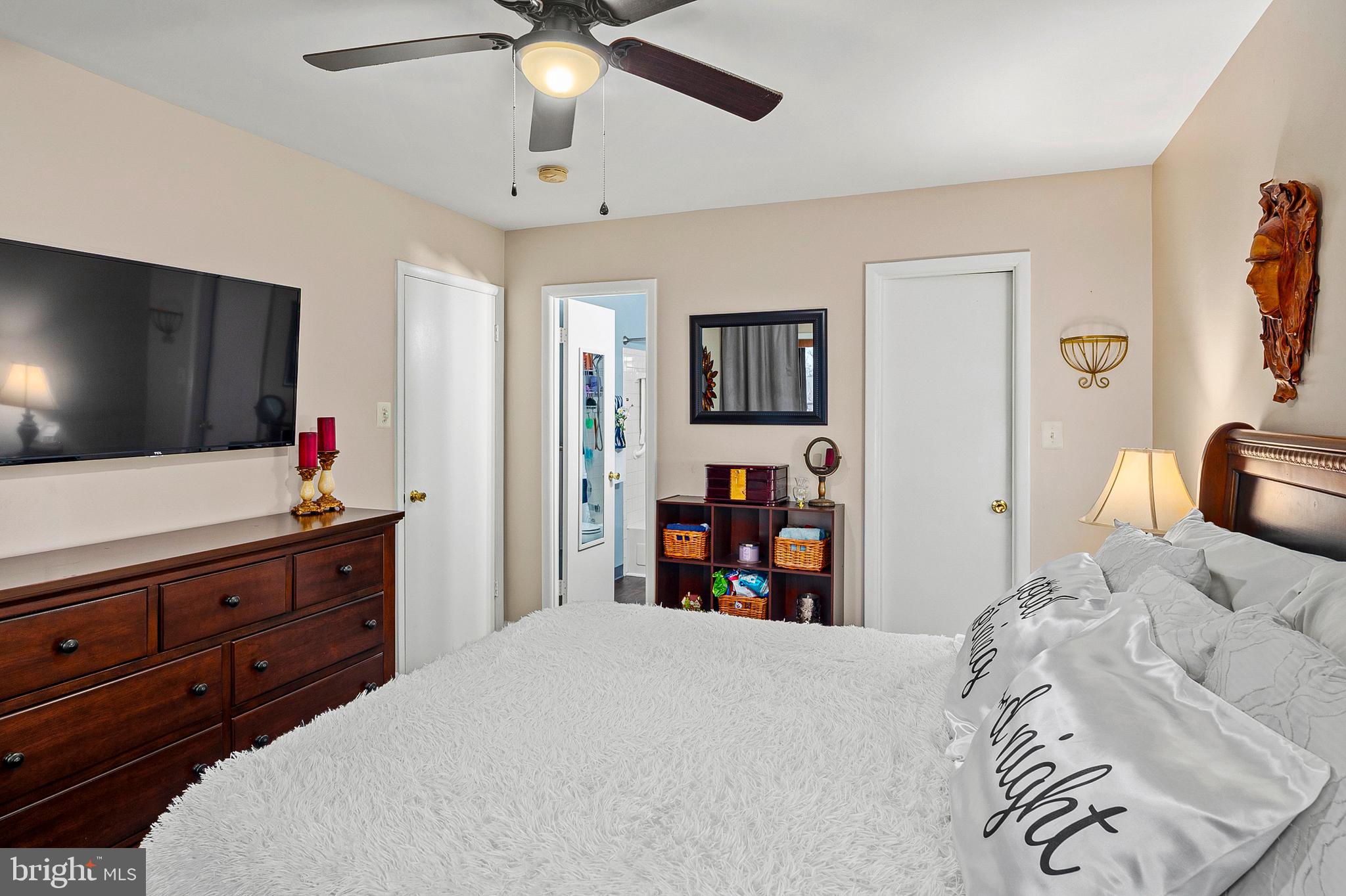 9550 Transfer Row Columbia, MD 21045 - Photo 15 of 27 a bedroom with a bed and a flat screen tv