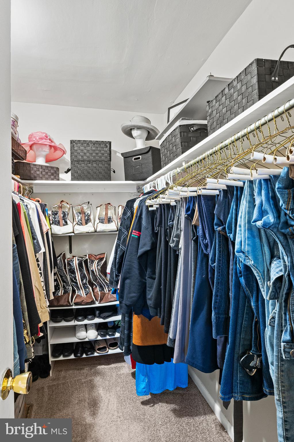 9550 Transfer Row Columbia, MD 21045 - Photo 16 of 27 a view of walk in closet with clothes and shoes