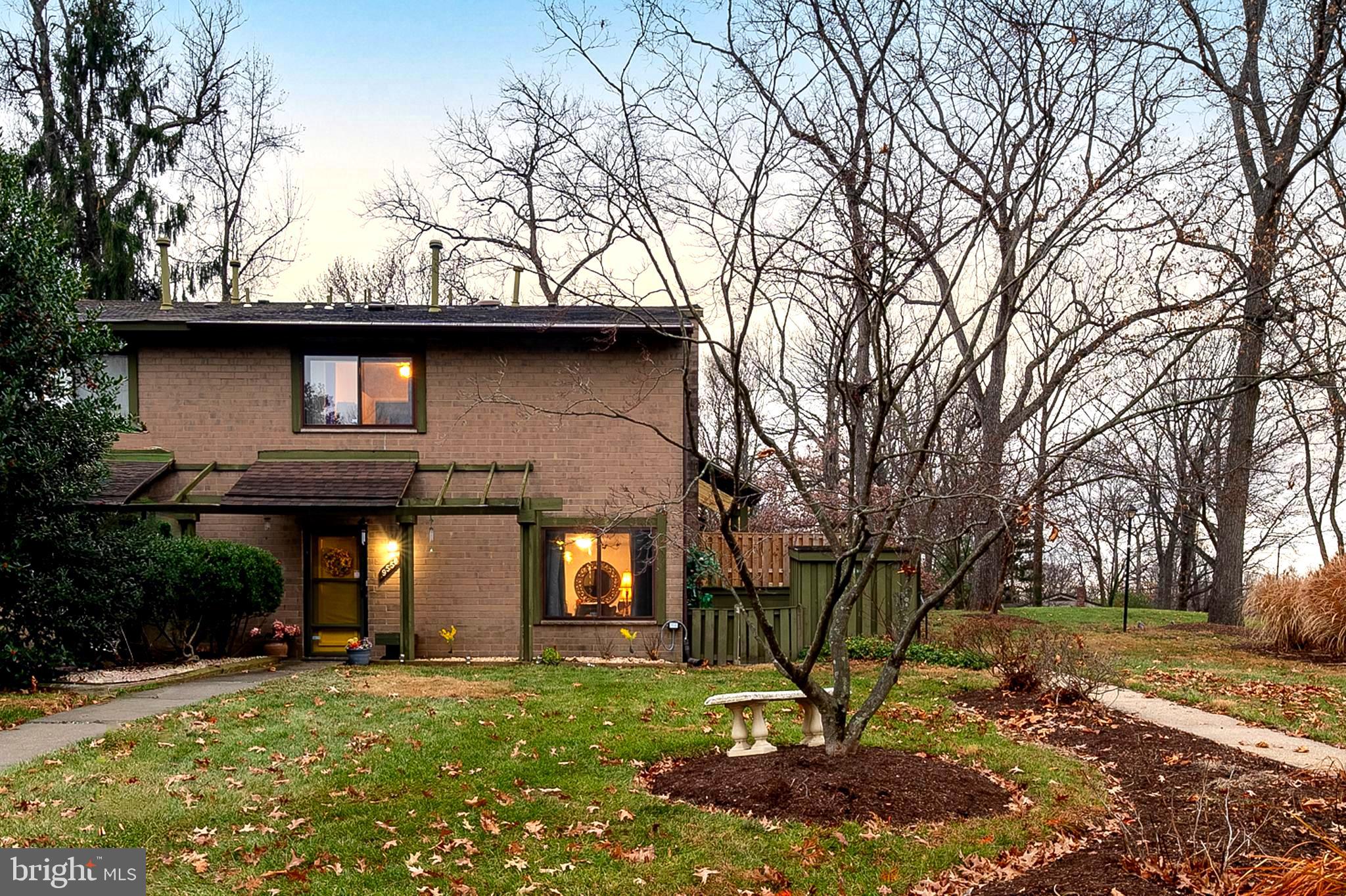 9550 Transfer Row Columbia, MD 21045 - Photo 2 of 27 a front view of a house with a yard