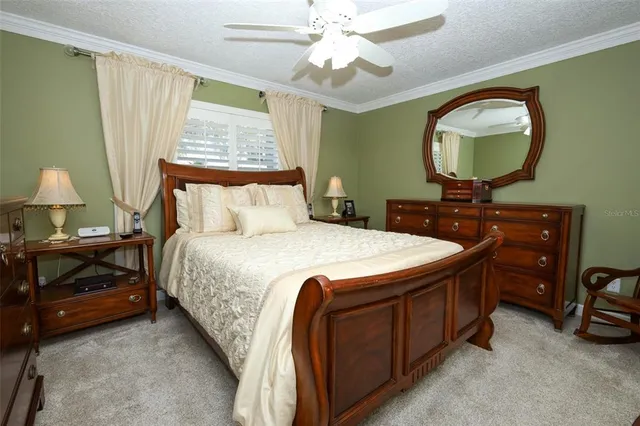a spacious bathroom with a granite countertop sink a toilet and a mirror