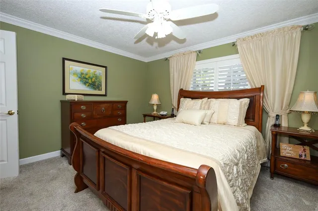 a bathroom with a sink a mirror and a shower