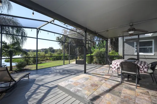 an aerial view of a house with ocean view