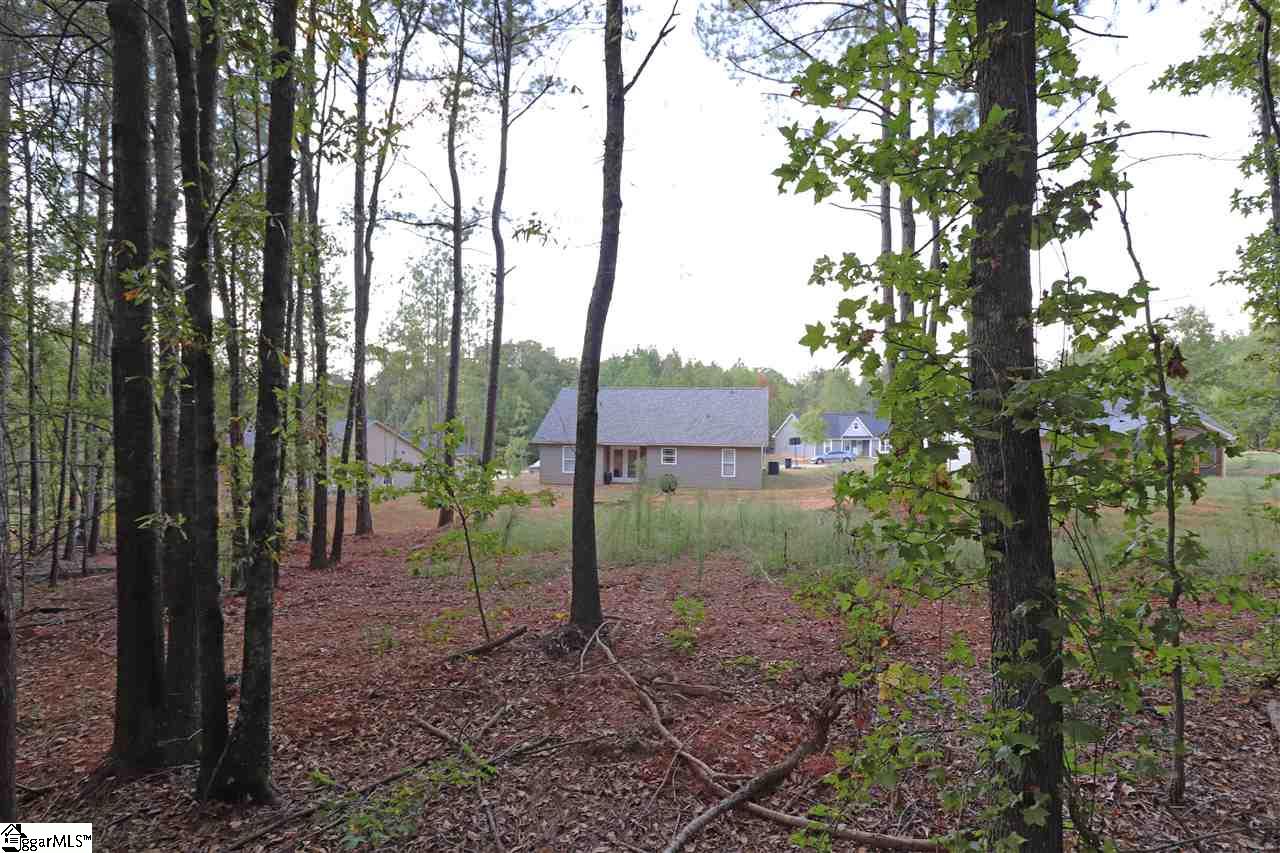 110 Sm Lyerly Road Anderson, SC 29621 - Photo 19 of 27 Back of lot goes 1/2 way into woods and backs up to a pasture. Nice privacy!