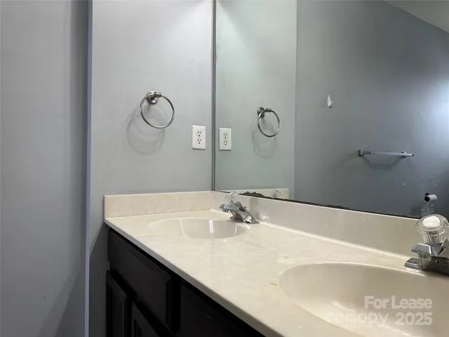 a bathroom with a sink and a bathtub