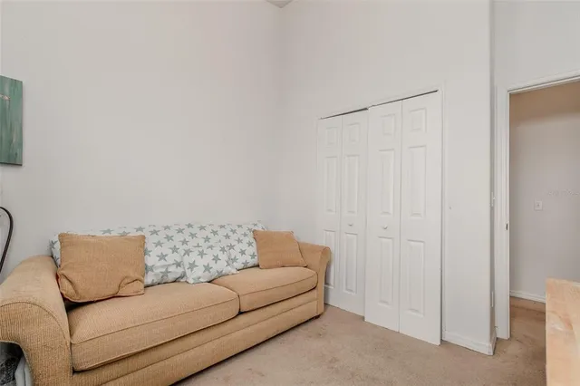a living room with furniture and a couch